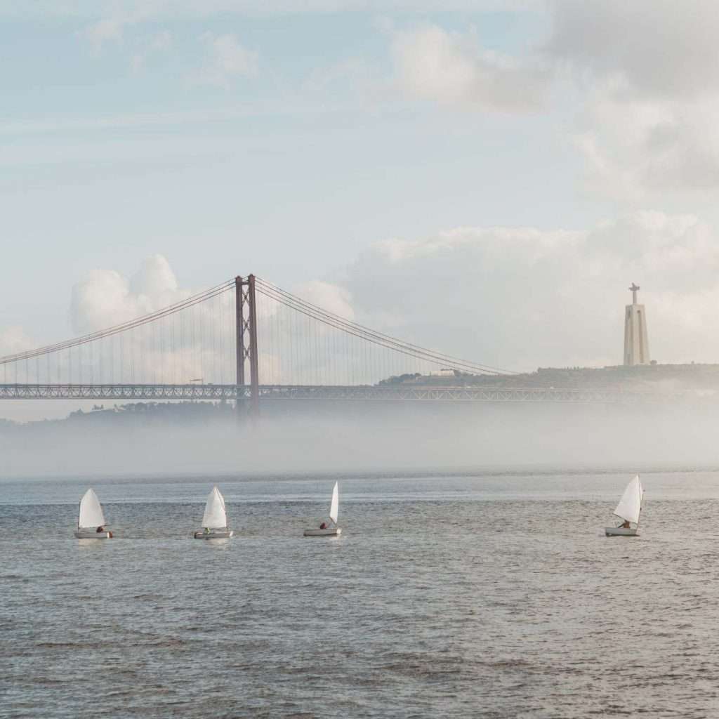 Misty Tagus river with sailboats